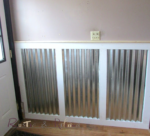 Using galvanized metal and pre-primed lumber for industrial wainscoting..
