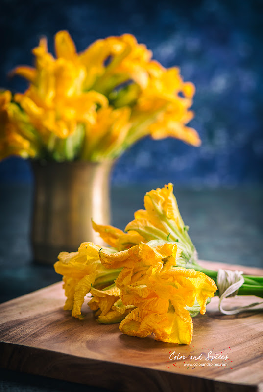 Pumpkin Flowers Dipped In Rice Paste And Fried Color and Spices: Kumro phool bhaja..