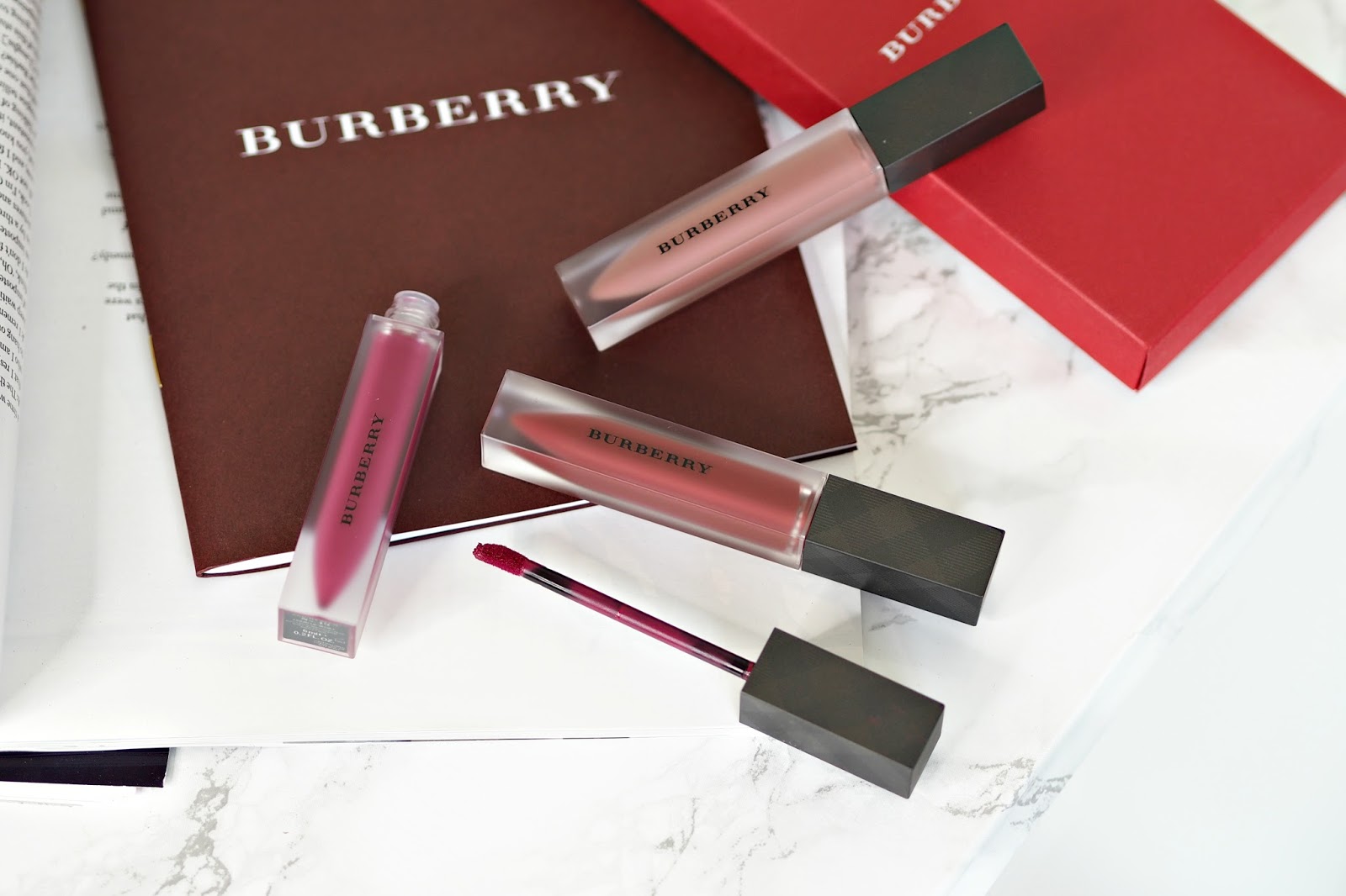Burberry Liquid Lip Velvet Lipsticks in oxblood, fawn and bright plum