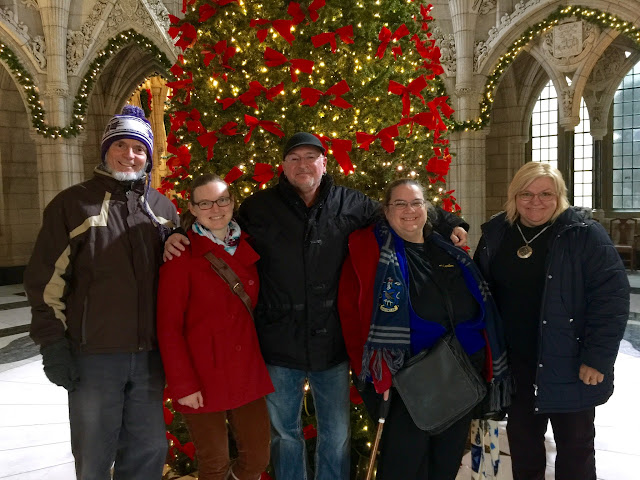 Pierre poses in the Great Hall with Stairwellers, David, Martha, Maggie and Manon