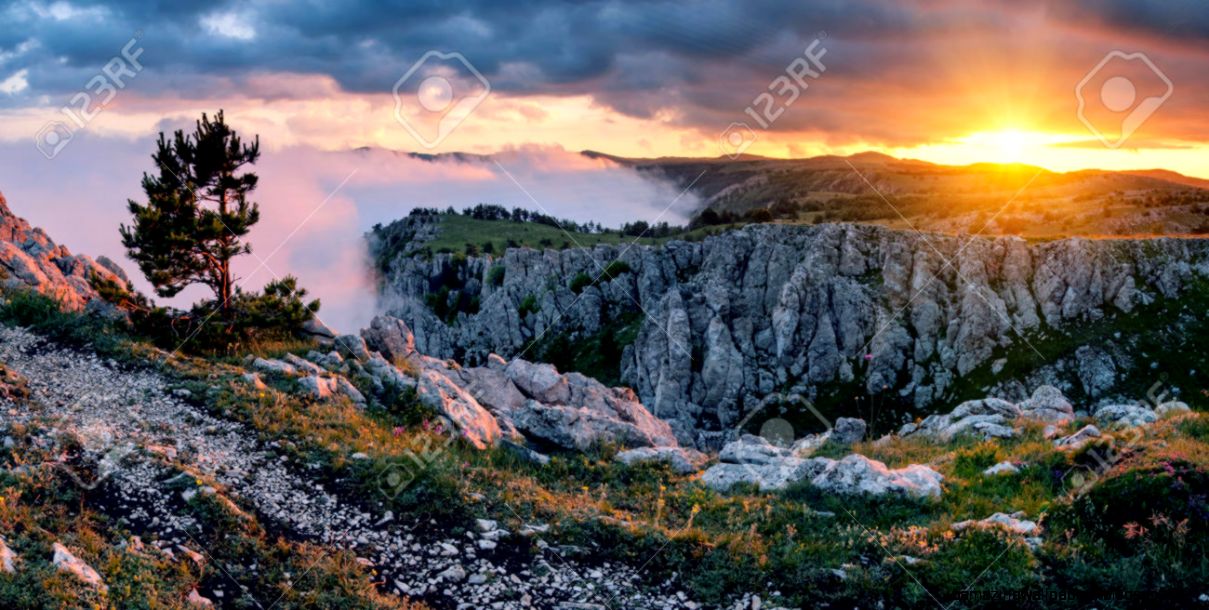 Wonderful Sunset In The Great Mountain Valley With A Beautiful