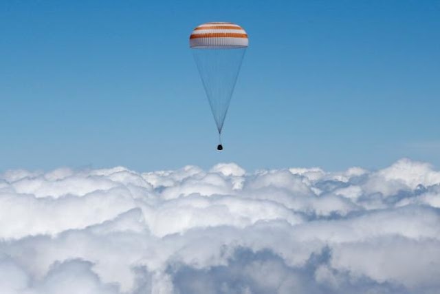 Soyuz capsule bringing back three astronauts from the International Space Station after 186 days