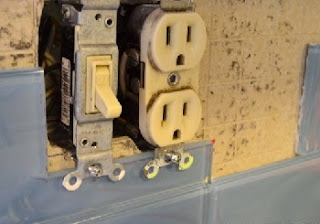 tiling around outlets and switches