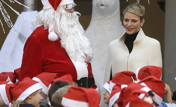 Prince Albert and Princess Charlene attend the Christmas gifts distribution