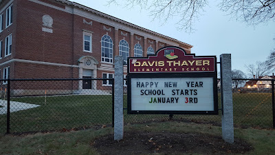 Davis Thayer Elementary School sign "Happy New Year, school starts Jan 3"