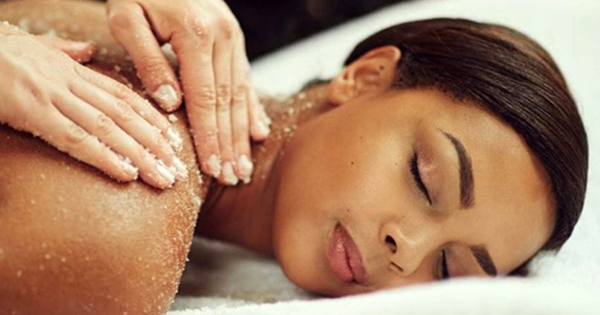 Woman getting a massage at a Black-owned spa