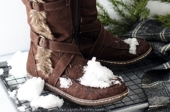 During the winter, bringing snowy boots and shoes into the house in inevitable.  But this easy project for a DIY Boot Tray will allow the boots to dry thoroughly and keep the snow and water off of your floors. #winter #organize #mudroom #andersonandgrant