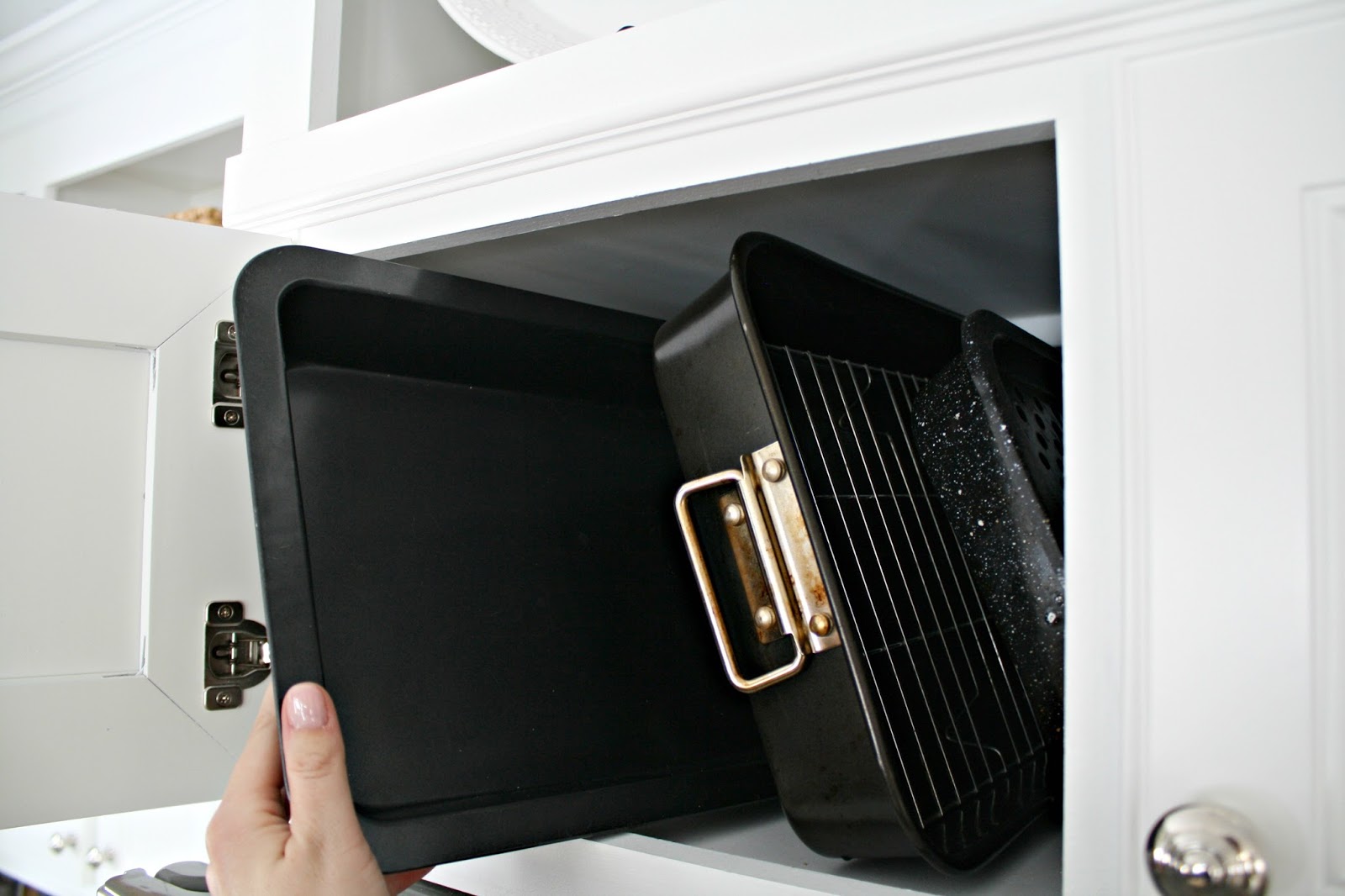 How to organize awkward pans above the fridge Thrifty Decor Chick