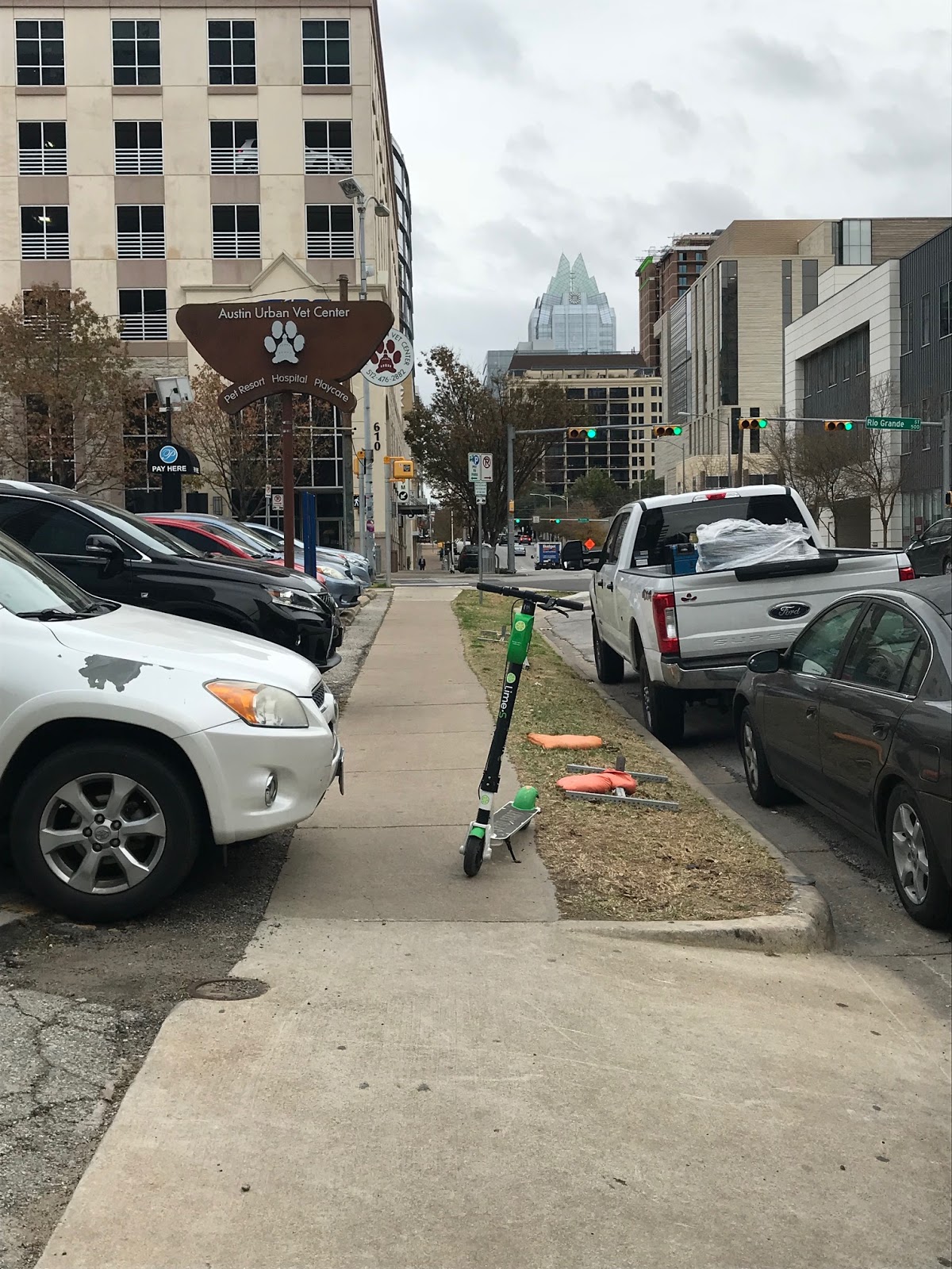Austin, Texas Daily Photo Scooter on the sidewalk.