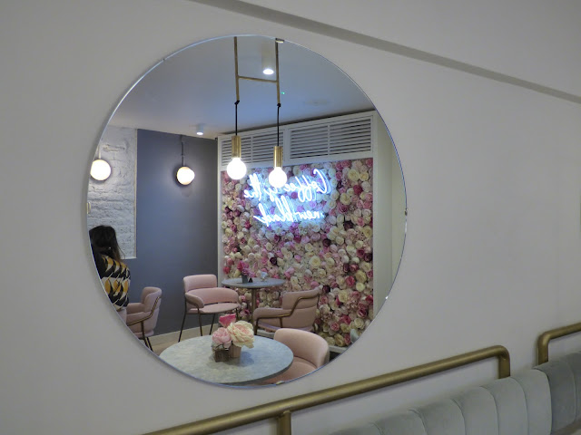 Pink flower wall at Elan Cafe, Park Lane, London