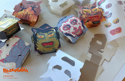 In the studio of Halloween artist Bindlegrim these vintage style slot-and-tab paper candy container lanterns begin to take shape