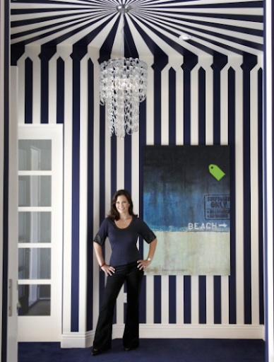 hallway with blue and white wall stripes
