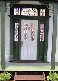 Front door of a one-twefth scale miniature traditional New Zealand villa