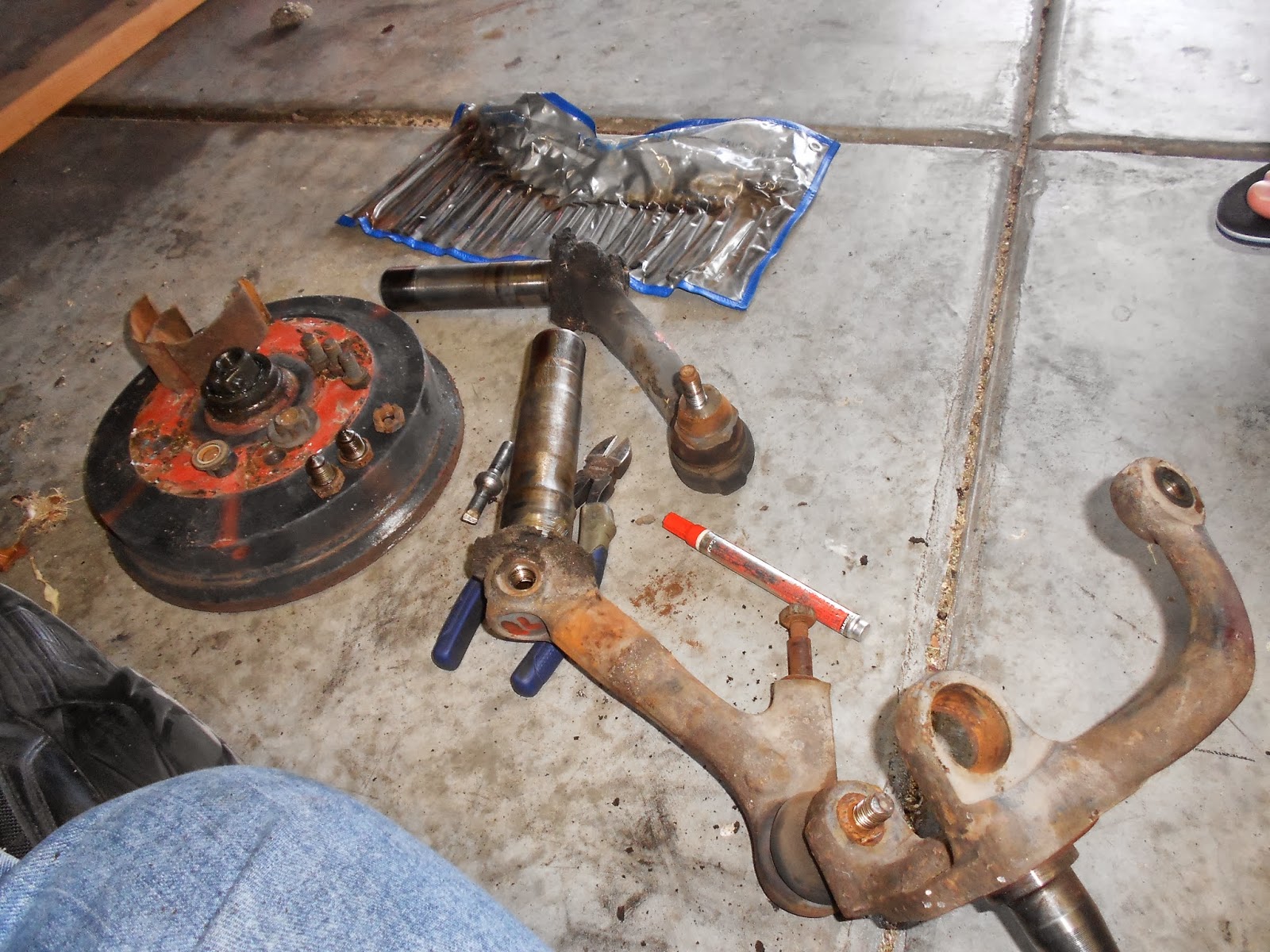 The Bug Boys Installing ball joints and raised spindles in the bug.
