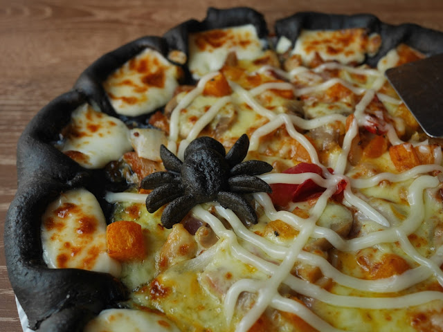 black dough spider on the Black Halloween Pizza at Pizza Hut in China