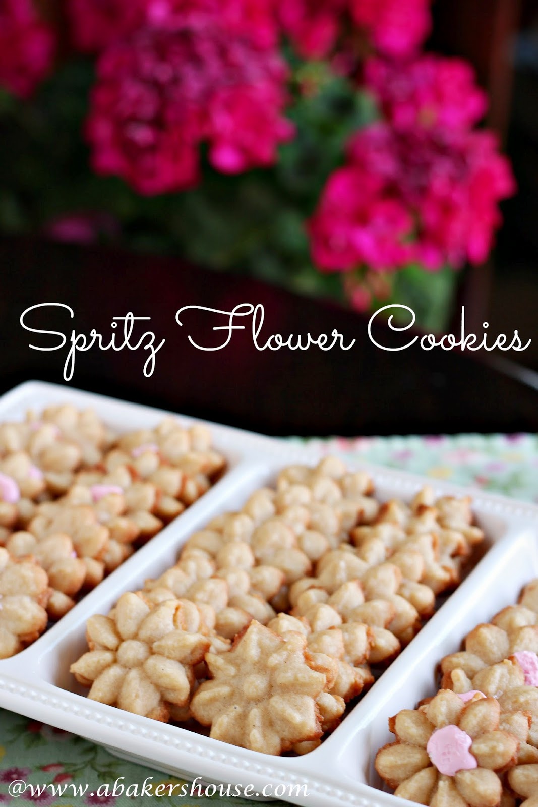Spritz Flowers Cookies with pink icing