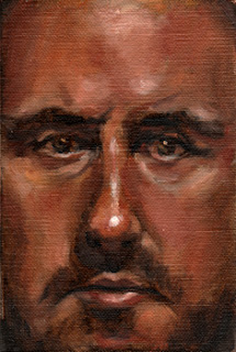 Oil painting of the face of a middle-aged man with light moustache and beard.