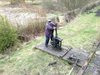 Sarah operating the ground frame at East Tanfield loop