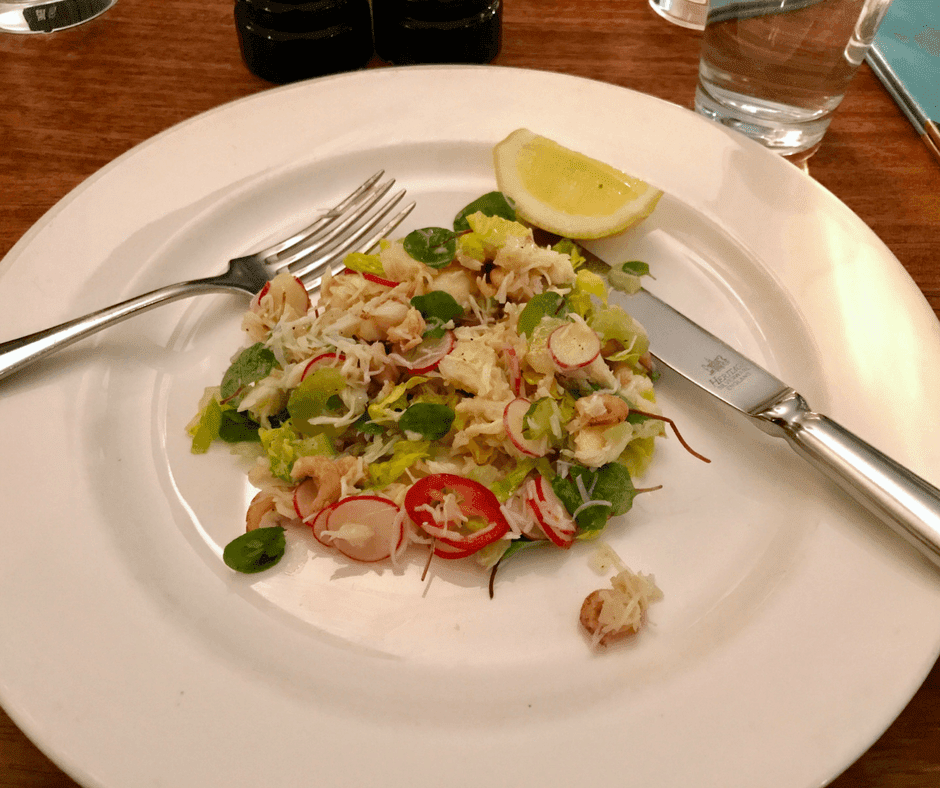 crab salad with brown shrimps, little gem, and radish. 