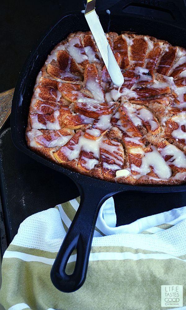 Skillet Apple Cake drizzled with a sweet, creamy glaze | by Life Tastes Good makes a fresh and irresistibly delicious dessert or even breakfast. Why not? There's fresh apples in this cake. Fruit for breakfast is perfectly acceptable, right?! #LTGRecipes 