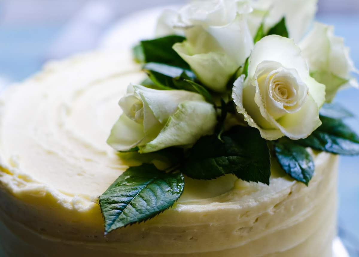 Lemon and Elderflower Cake with fresh flowers photo