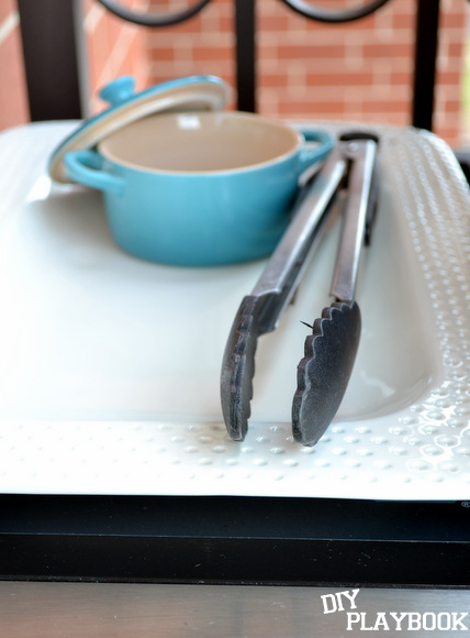 Grill supplies like a large pan and a sturdy pair of tongs make outdoor grilling so much easier! 
