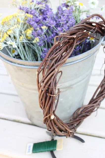 grapevine wreath used to make a dried herb wreath