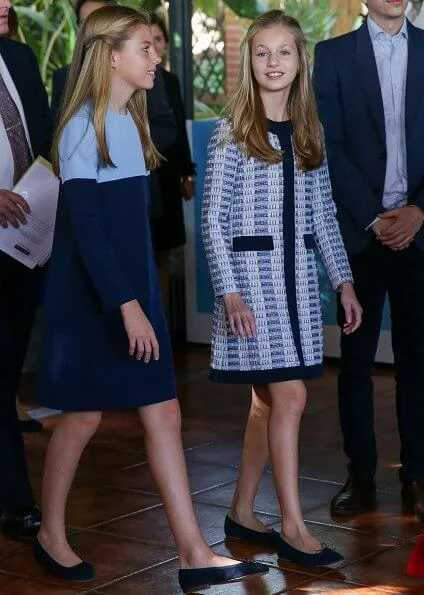 Queen Letizia wore Roberto Torretta suit from Torretta Fall Winter 2017 2018 collection. Princess Leonor Mango tweed coat dress