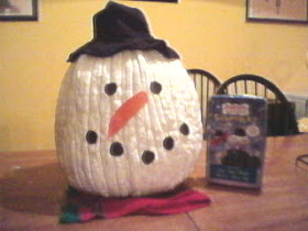 Need pumpkin decorating ideas? Okay, he's not a recycled pumpkin just a leftover - Make a Snowman Jack-o-lantern
