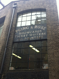 Ghost sign for Pring and Rose, Showcards, Ticket Writers and Printers, Marylebone Passage, London W1