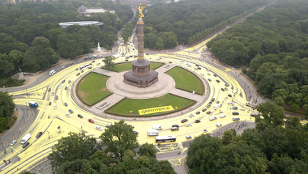 Kreativer Protest von Greenpeace - Sonne statt Kohle | Der Kreisverkehr der Berliner Siegessäule wurde zur Sonne