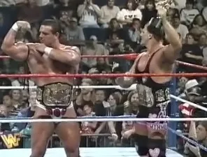 WWF / WWE - In Your House 11: Buried Alive - Owen Hart & British Bulldog retained the WWF tag team titles against The Smoking Gunns