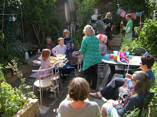 families in the sun in back garden