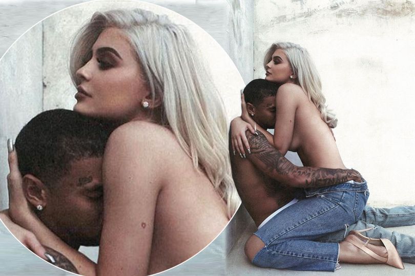 Topless Kylie Jenner straddles birthday boy Tyga in racy sna.