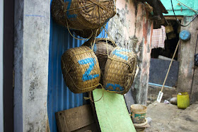baskets, fish, fisherman, home, koliwada, worli, mumbai, india, streetphoto, street photography, oar, bucket, 