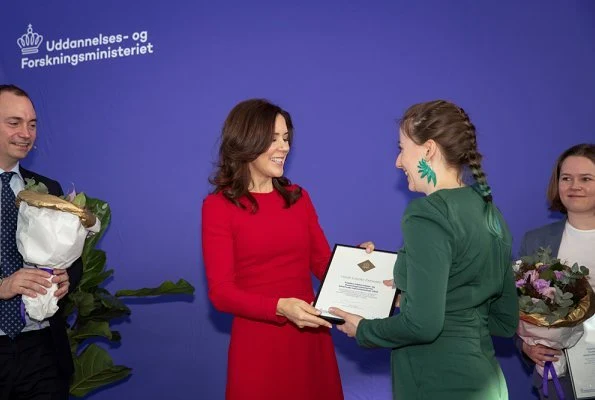 Crown Princess Mary wore a red midi dress by Dolce and Gabbana. Crown Princess Mary Dolce & Gabbana red contrast-stitch cady dress