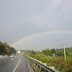 Rainbow crossing the road