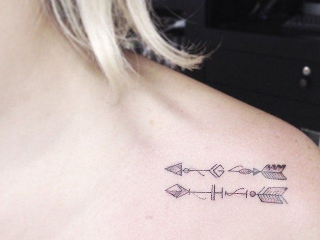 tatuajes de flechas para mujeres