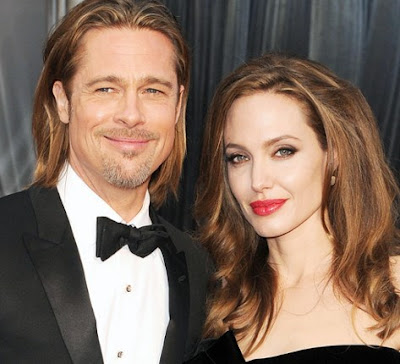 Brad Pitt y Angelina Jolie Foto de Brad Pitt y Angelina Jolie sonriendo