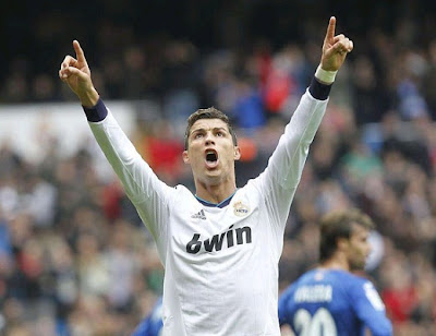 Cristiano Ronaldo celebrates his hat-trick against Getafe