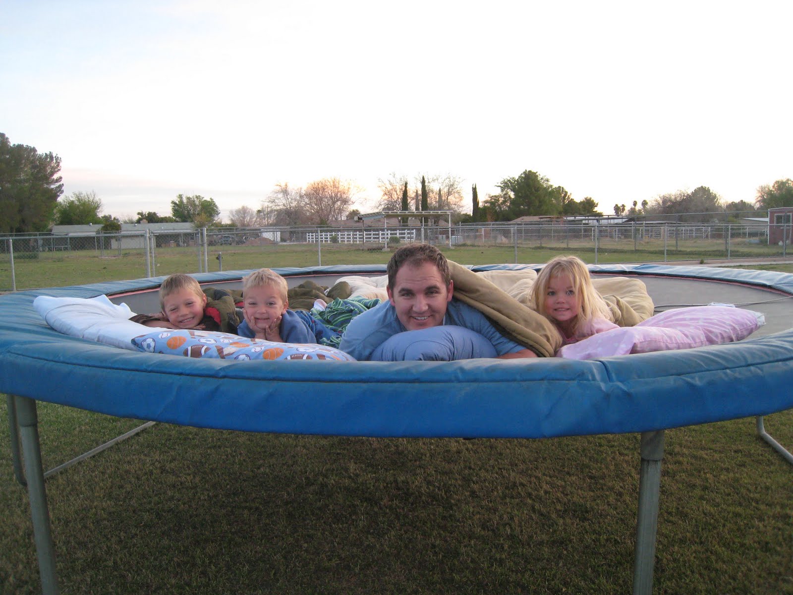 Brimhall Family: Sleeping on the trampoline