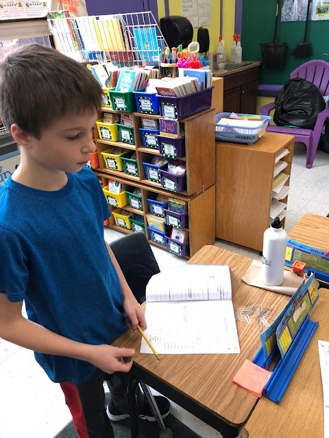 student working with magnets