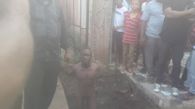 Man Stripped Unclad And Beaten Mercilessly After He Was Caught Stealing In Owerri. Photos Guil2