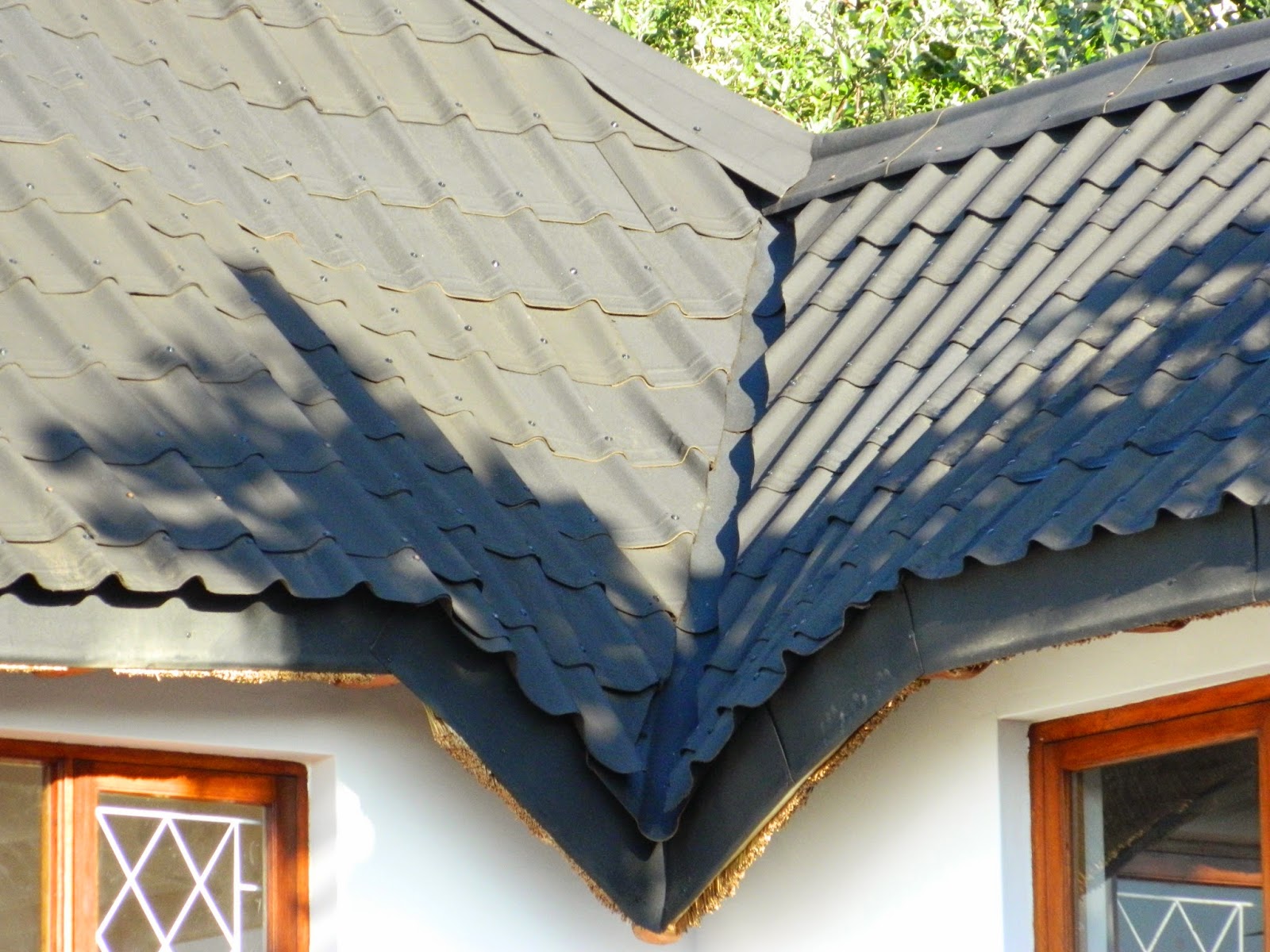Change a Thatch Roof to Onduvilla Tiles