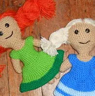 http://www.ravelry.com/patterns/library/anna-and-elsas-dolls