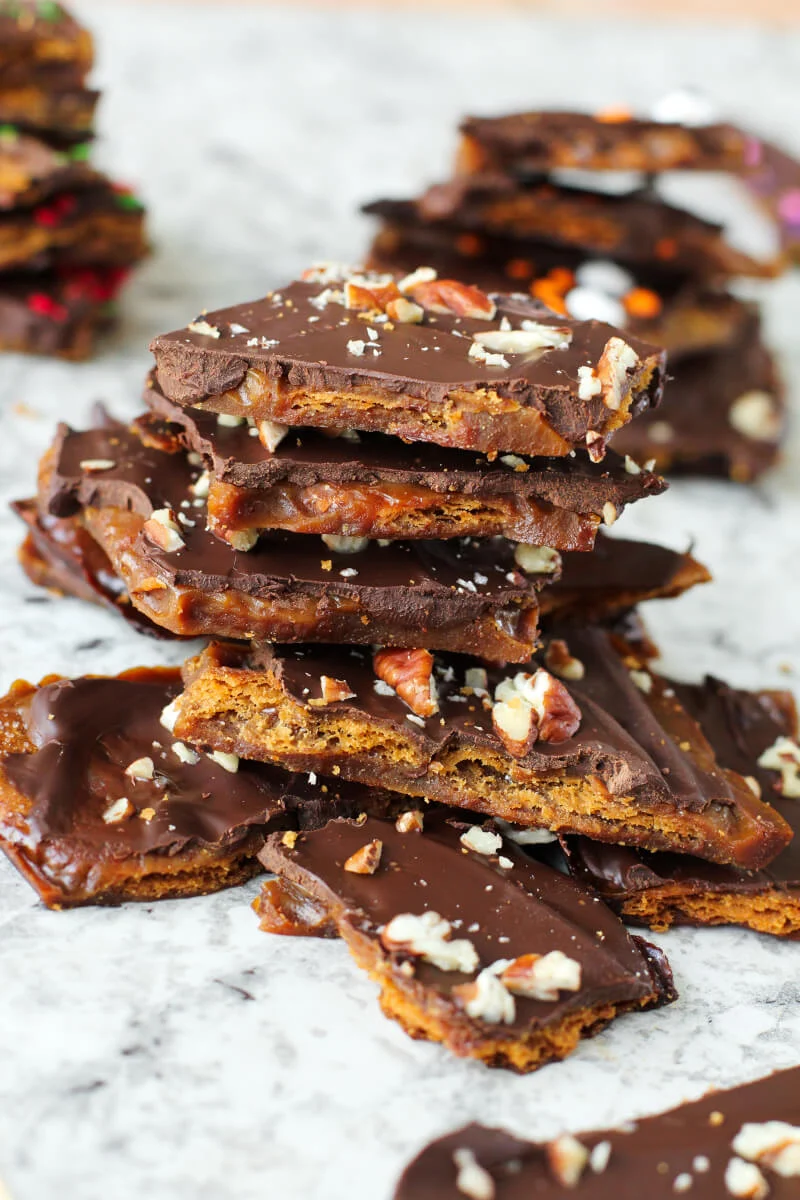 This Easy Ritz Cracker Toffee recipe is sweet, salty, chocolaty, buttery and completely irresistible.  It's a great chocolate dessert for any holiday and it makes the perfect foodie gift!  #toffee #dessert #chocolate