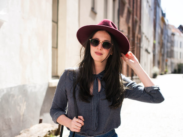 Outfit: wide brim hat, A-line skirt and leather loafers