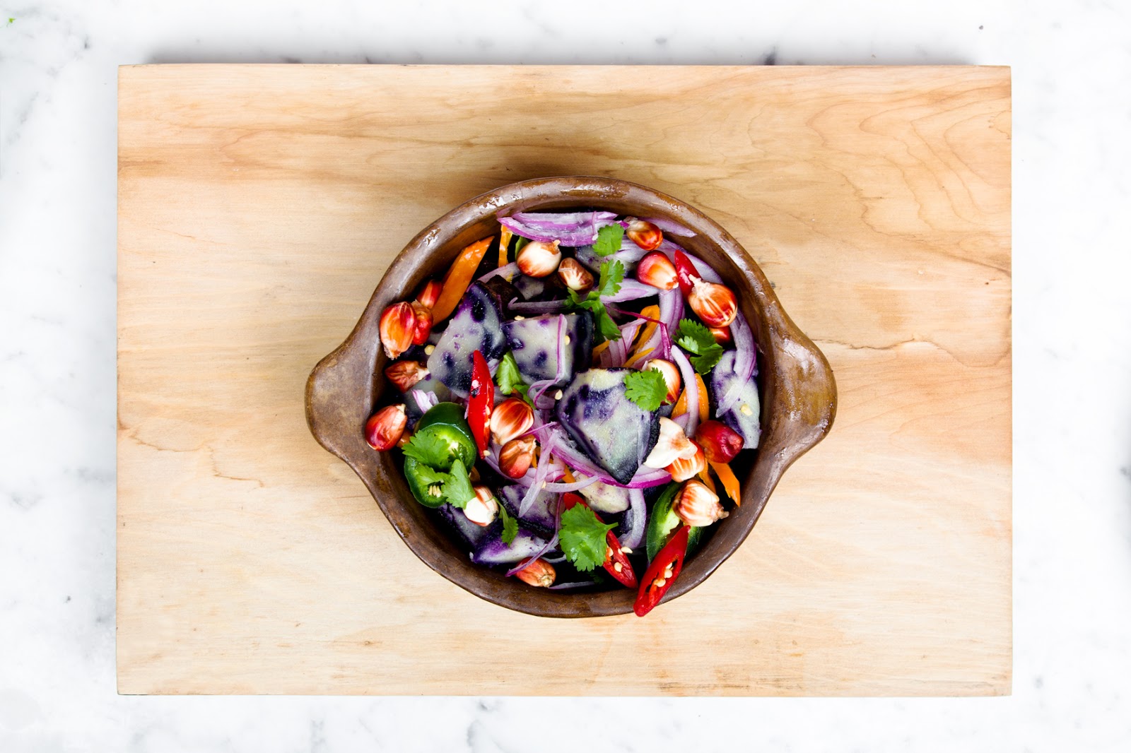 Purple Potato Salad with Roasted Grape Tomatoes Sweet and Hot Peppers