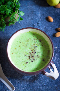 creamy vegan soup made with blanched broccoli and almonds