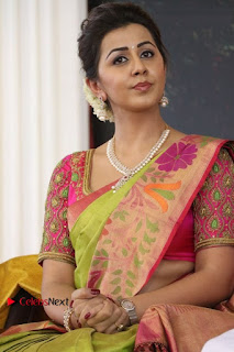 Actress Nikki Galrani Latest Pos in Saree Neruppu Da Movie Audio Launch  0013